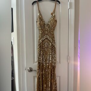 Brand new never been worn Paul Rekhi gold dress 
-Size 6